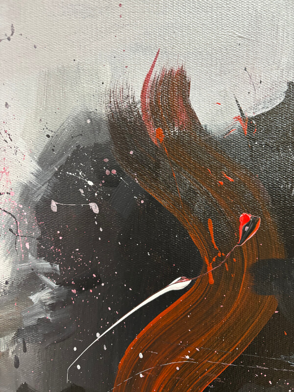 Close-up detail of an abstract painting with a sweeping reddish-brown brushstroke over dark black and gray layers, accented by white lines and small red paint splashes on textured canvas.