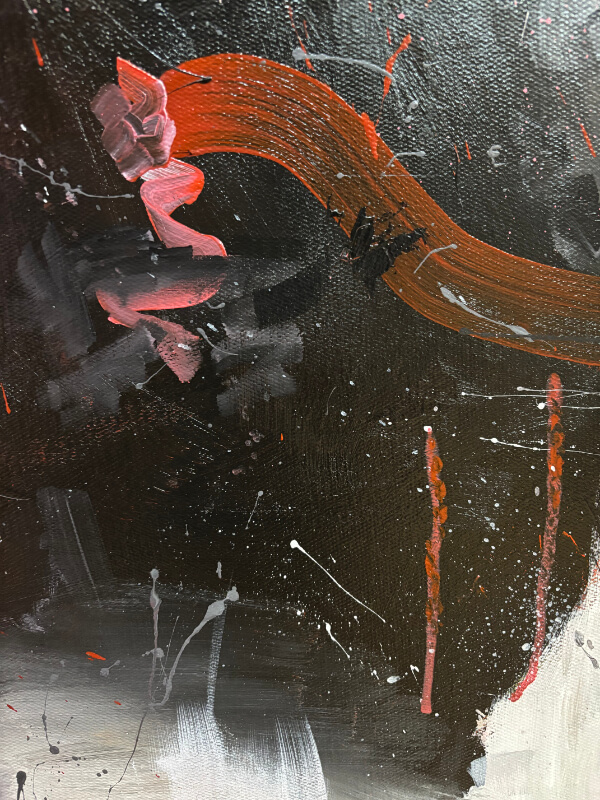 Close-up detail of an abstract painting with a sweeping rust-orange brushstroke across a dark black surface, accented by pink highlights, white splatters, and textured canvas grain.