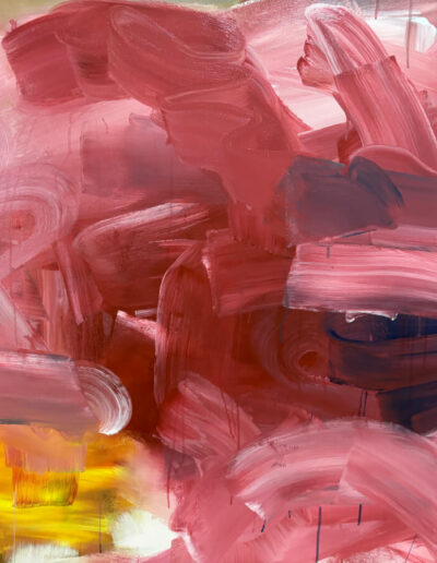 Close-up of thick pink-red brushstrokes layered over glowing yellow-orange, with dark blue blocks and a flash of neon yellow.