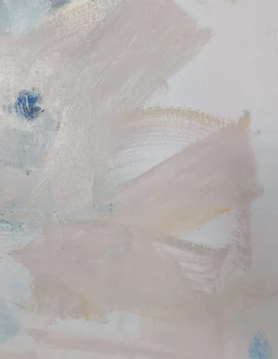 Close-up of pale pink, white and grey brushstrokes partially covering small blue and red marks, revealing layered paint texture.